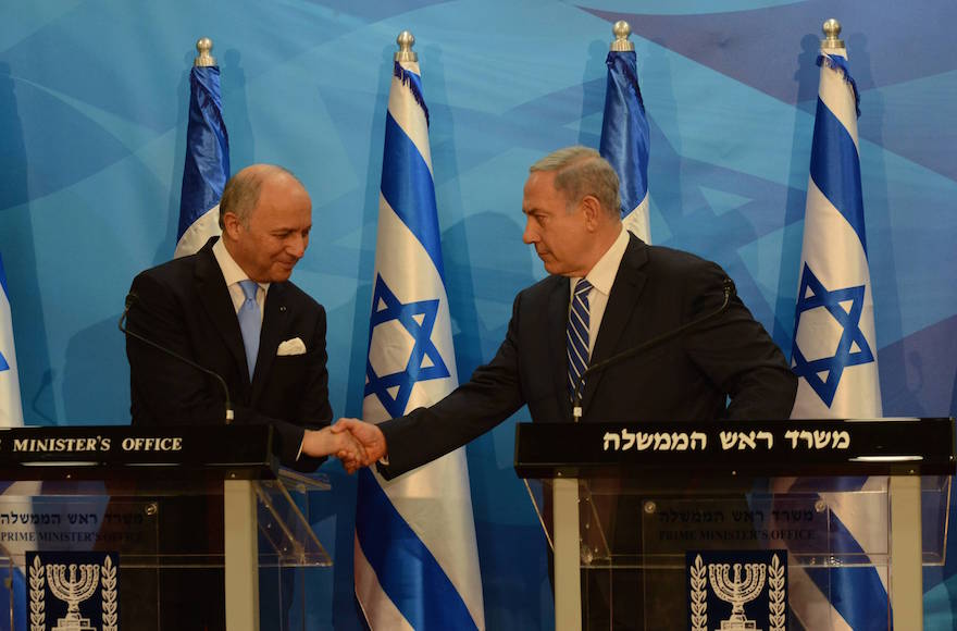 Israeli Prime Minister Benjamin Netanyahu meets with French Foreign Minister Laurent Fabius in Israel on June 21, 2015. (Haim Zach/GPO)