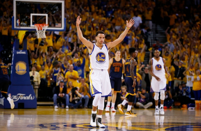 Stephen Curry of the Golden State Warriors celebrates during Game Two of the 2015 NBA Finals at ORACLE Arena in Oakland, California on June 7, 2015. (Ezra Shaw/Getty Images)