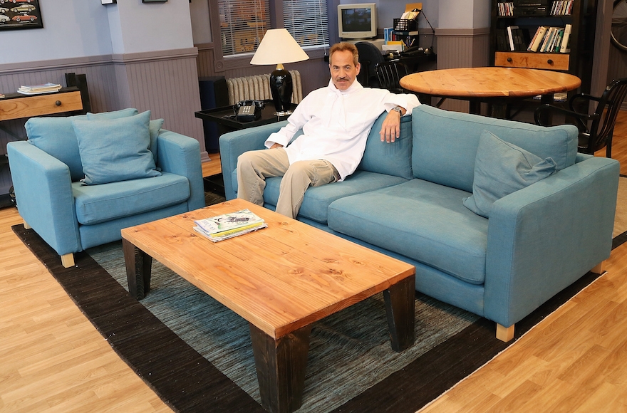 Actor Larry Thomas, known for his role as the "soup Nazi," posing in the recreated "Seinfeld" apartment in New York City on June 23, 2015. (Monica Schipper/Getty Images for Hulu)