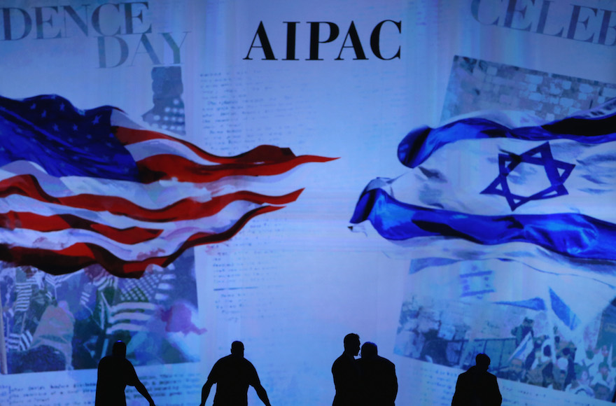 Workers prepare the stage before for Israeli Prime Minister Benjamin Netanyahu's address to the American Israel Public Affairs Committee 2015 Policy Conference. (Mark Wilson/Getty Images)