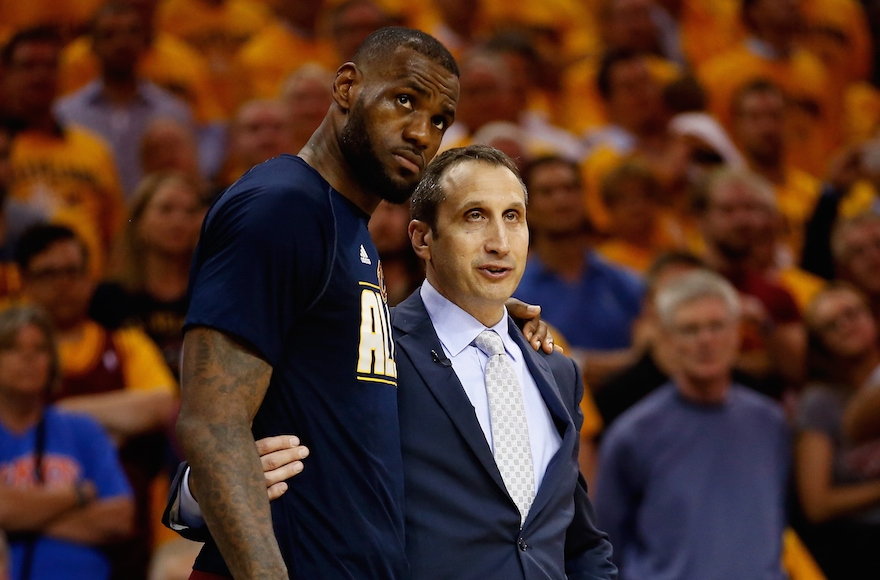 LeBron James and his Israeli-American coach David Blatt speaking late in the fourth quarter of a game against the Atlanta Hawks during the NBA's Eastern Conference Finals, May 26, 2015. (Gregory Shamus/Getty Images)