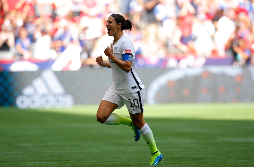 Carli Lloyd celebrates scoring the opening goal against Japan in the FIFA Women's World Cup Canada 2015 Final at BC Place Stadium in Vancouver, Canada on July 5, 2015. (Kevin C. Cox/Getty Images)