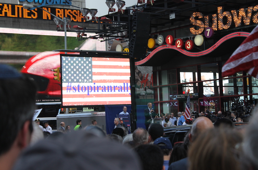 Former New York Governor George Pataki speaking in Times Square at the