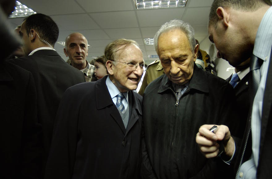Lord Greviile Janner, left, with former Israeli Prime Minister Shimon Peres during a visit to Israel in 2009. (Courtesy of the office of Lord Janner)