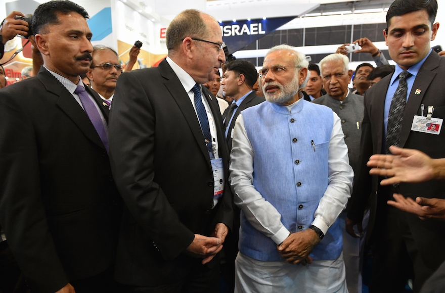 Israeli Defense Minister Moshe Ya'alon talking with Indian Prime Minister Narendra Modi on a recent visit to India on February 15, 2015. (Ariel Hermoni-Levine /Israeli Ministry of Defense via Getty Images)