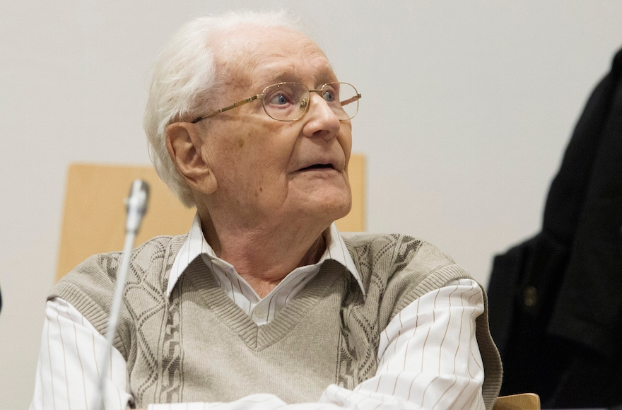 Oskar Groening, 93, arrives for the first day of his trial to face charges of being accomplice to the murder of 300,000 people at the Auschwitz concentration camp, April 21, 2015, in Lueneburg, Germany. (Andreas Tamme/Getty Images)