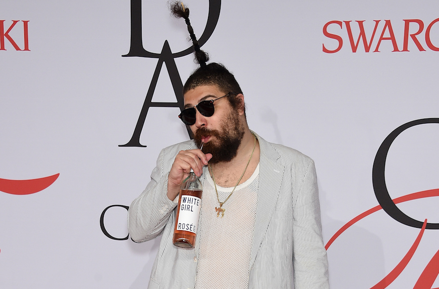 The Fat Jew sipping his own brand of wine on June 1, 2015, in New York. (Dimitrios Kambouris/Getty Images)
