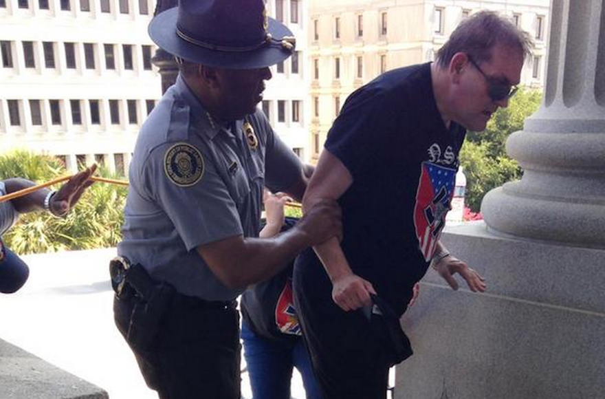 Leroy Smith, left, helped a neo-Nazi protestor survive the South Carolina heat on July 18, 2015. (Twitter)