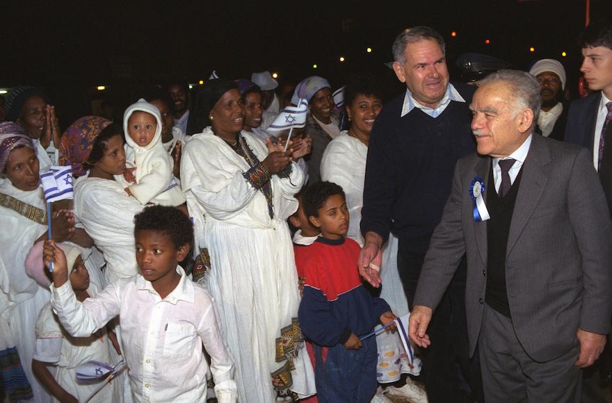 Former Israeli Prime Minister Yitzhak Shamir greeting Ethiopian immigrants in 1991. (Wikimedia Commons)