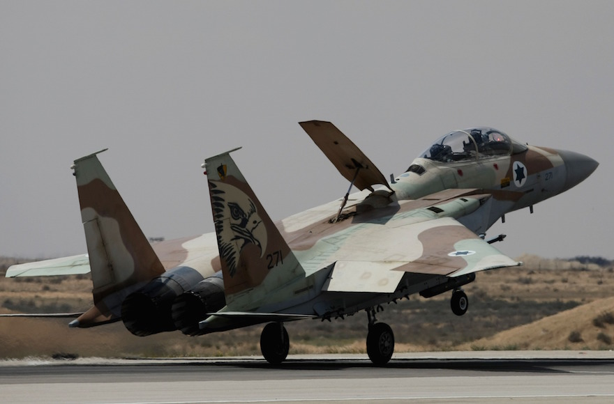 An Israel Air Force F-15 fighter jet lands at the Hatzerim air base, on March 30, 2009, in Hatzerim, Israel. (Uriel Sinai/Getty Images)