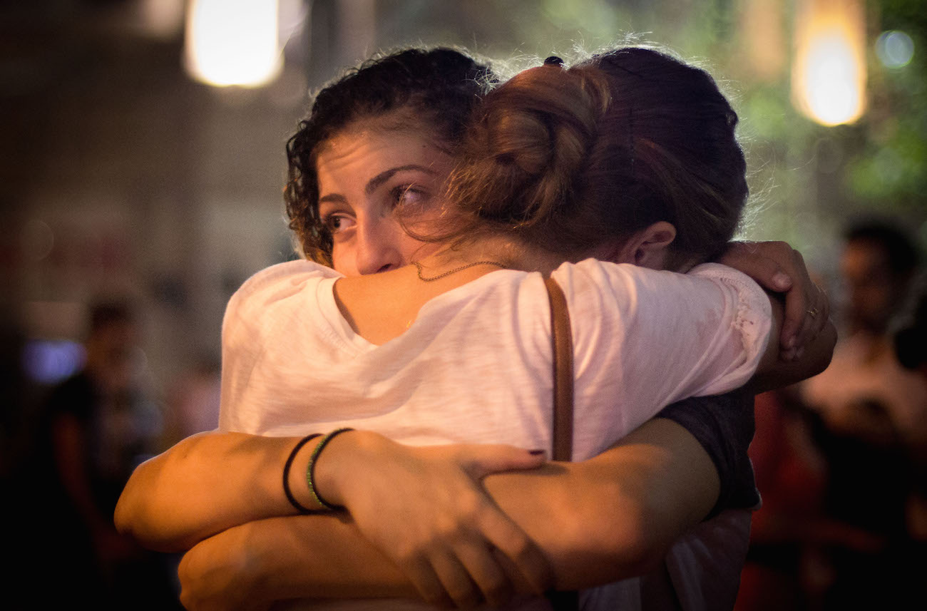 Israelis participating in a memorial service in Jerusalem for Shira Banki, who was fatally wounded in an attack at Jerusalem’s gay pride parade, Aug. 2, 2015. (Garrett Mills/Flash90)