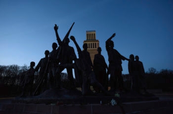 The figural group by Fritz Cremer and the belltower at the memorial for the victims of the Nazi concentration camp Buchenwald, April 12, 2015, near Weimar, Germany. (Jens Schlueter/Getty Images)