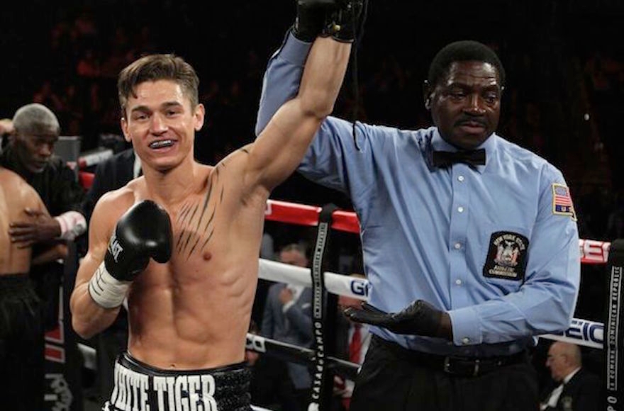 Dustin Fleischer celebrating after beating Karim Miller at the Barclays Center in Brooklyn, New York, in June. (Rich Kane/Roc Nation Sports)