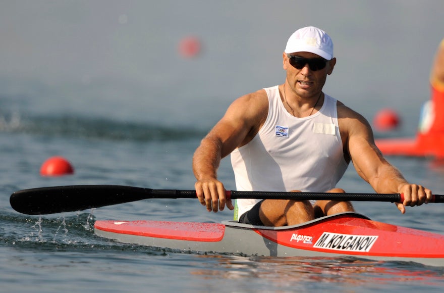 Israel's Michael Kolganov relaxing after winning a heat at the Beijing 2008 Olympics, Aug. 19, 2008. (Kevork Djansezian/AP Images)