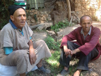 Etrog grower (and retired restaurant worker) Mohammed Douch, left, with his cousin. (Ben Sales)