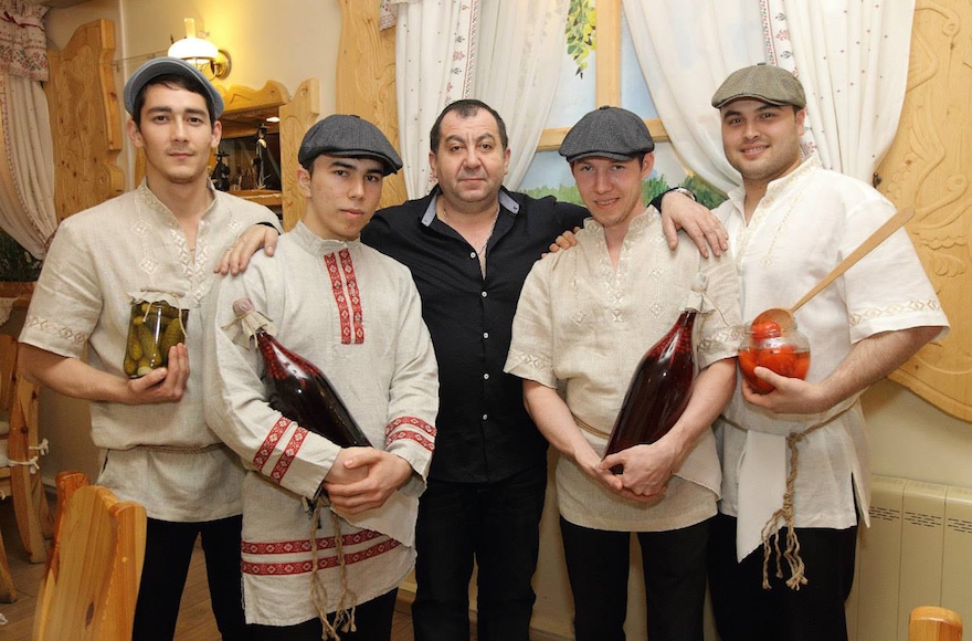 Pinhas Slobodkin, center, with staff at a Moscow event serving kosher food in 2014. (Courtesy of Pinhas Slobodkin) 