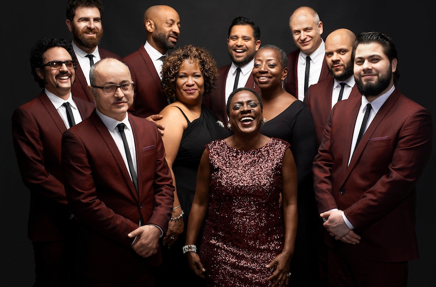 Gabe Roth, far left with horseshoe mustache, leads Sharon Jones and the Dap Kings, a meticulously retro soul group with several Jewish members. (Jacob Blickenstaff)
