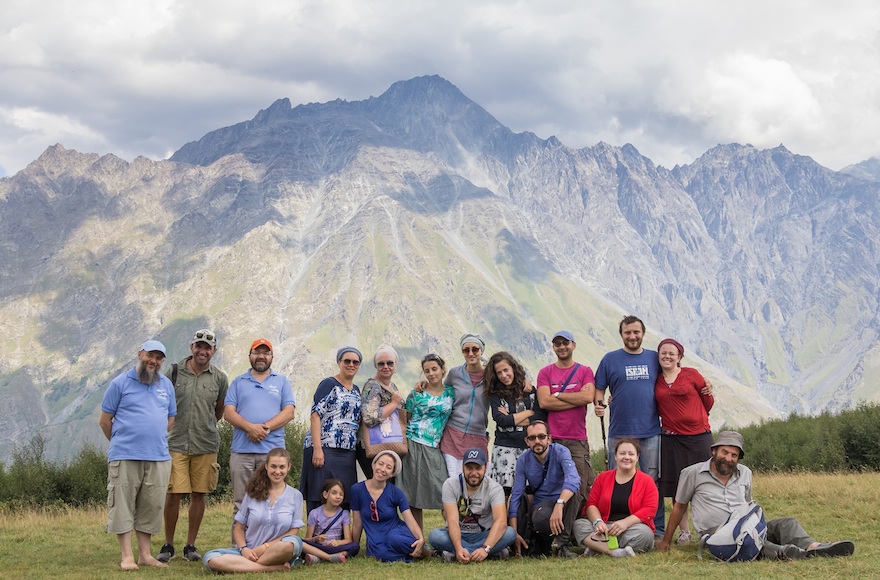 Rabbi Shlomo Ne'eman, left, founder of the Kiev-Based Zionist Seminary, and staff at the Tchelect summer camp in Georgia on Aug. 19, 2015. (Eliyahu Yurovsky)