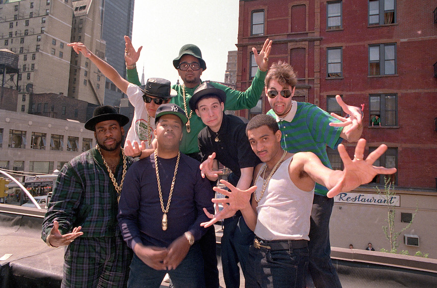 The Beastie Boys posing with Run-DMC atop a restaurant in midtown Manhattan, May 11, 1987. (Marty Lederhandler/AP Images)