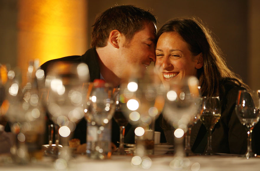 Two American Jews enjoying a party in Jerusalem at the end of a weeklong romantic voyage to Israel organized by JDate, May 10, 2006. (Oded Balilty/AP Images)