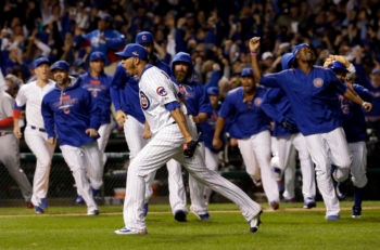 The Chicago Cubs celebrating their win against the St. Louis Cardinals in the National League Division Series in Chicago, Oct. 13, 2015. (Nam Y. Huh/AP Images)