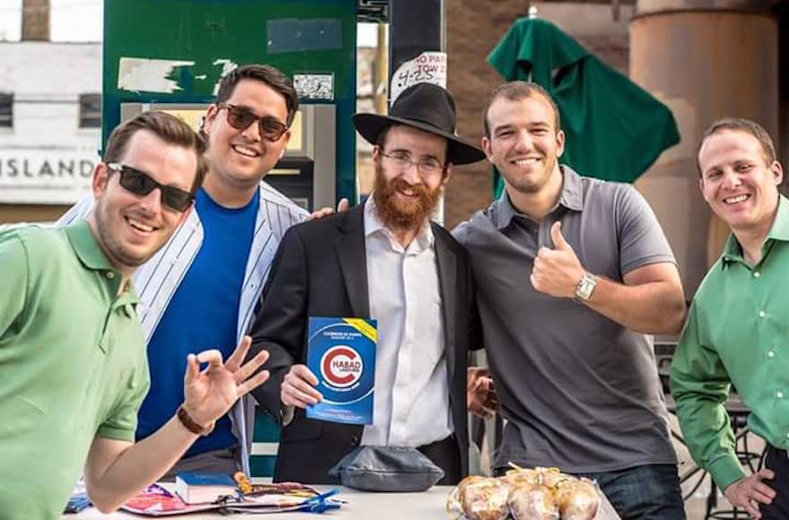 Rabbi Kotlarsky has started a tefillin tradition outside of Chicago's Wrigley Field. (Chabad.org)