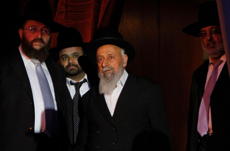 Rabbi Shimon Ba'adani enters the stage of a convention for Jewish religious women held in Jerusalem on June 28, 2010. (Miriam Alster/Flash90)