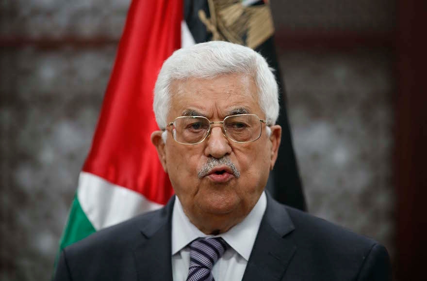 Palestinian president Mahmoud Abbas speaking at a press conference after the arson attack by Jewish extremists that killed a Palestinian toddler in the West Bank city of Ramallah, July 31, 2015. (Flash90)