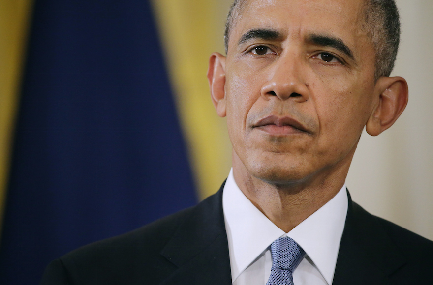 President Barack Obama listening to reporters' questions during a joint news conference with French President Francois Hollande in the East Room at the White House in Washington, D.C., Nov. 24, 2015. (Chip Somodevilla/Getty Images)