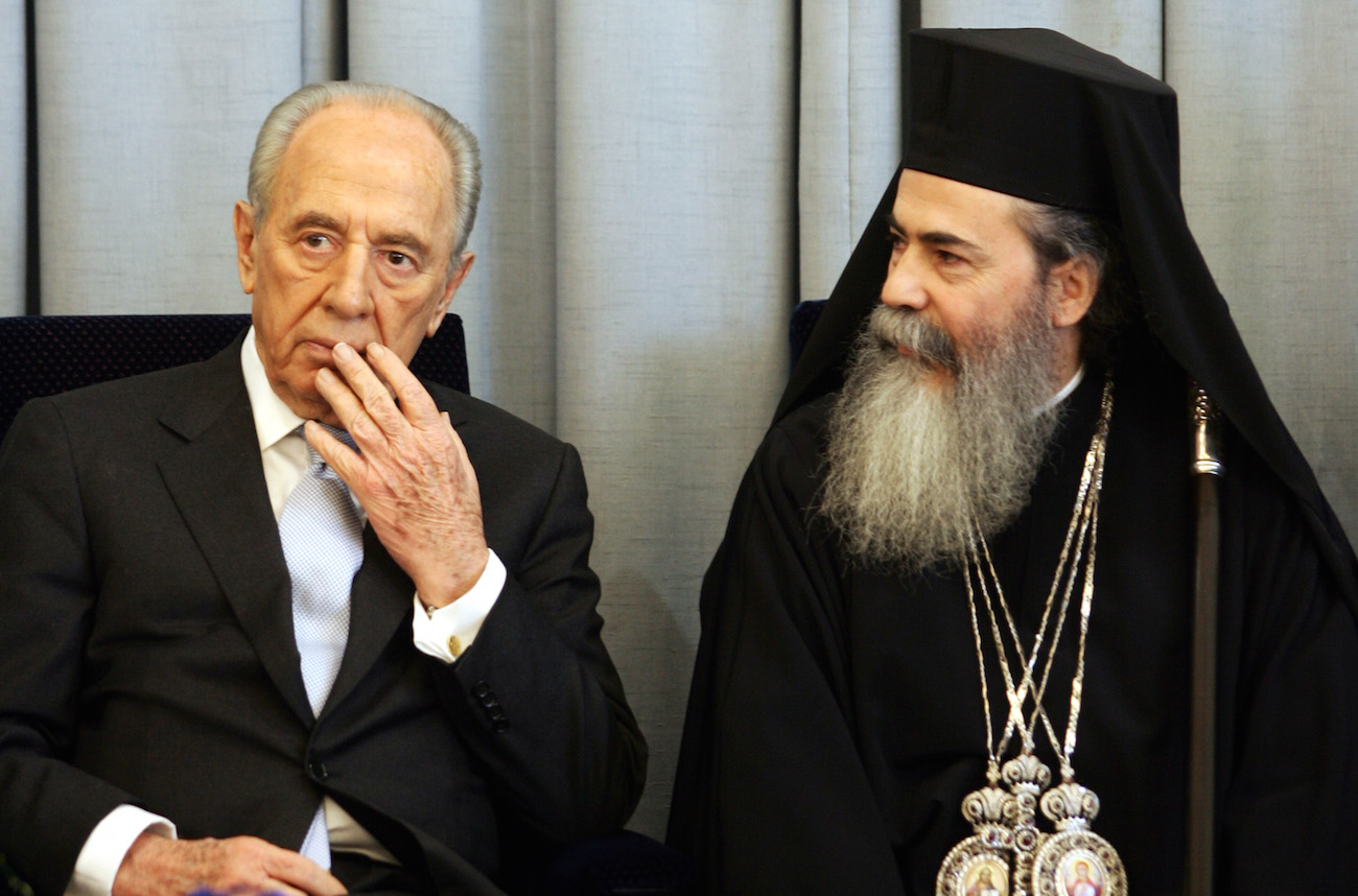 The Greek Orthodox Patriarch of Jerusalem, Theofilos III, meeting with Israeli President Shimon Peres in Jerusalem in 2007. (Kobi Gideon/FLASH90)