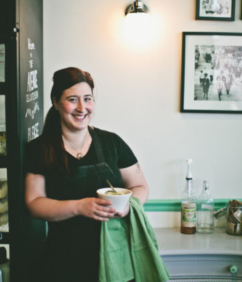 Laura Frangiosa, owner of The Avenue Delicatessen in suburban Philadelphia, holding her signature Jewish wedding soup. (Neal Santos) 