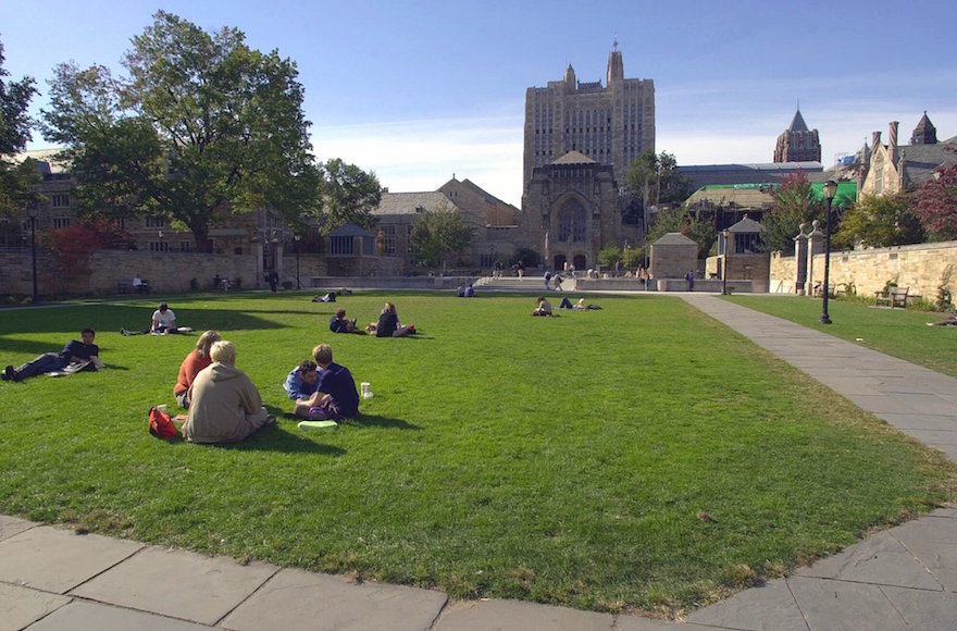 Yale University students and others spending a fall afternoon on campus in New Haven, Conn., Oct. 11, 2000. (Bob Child/AP Photo)