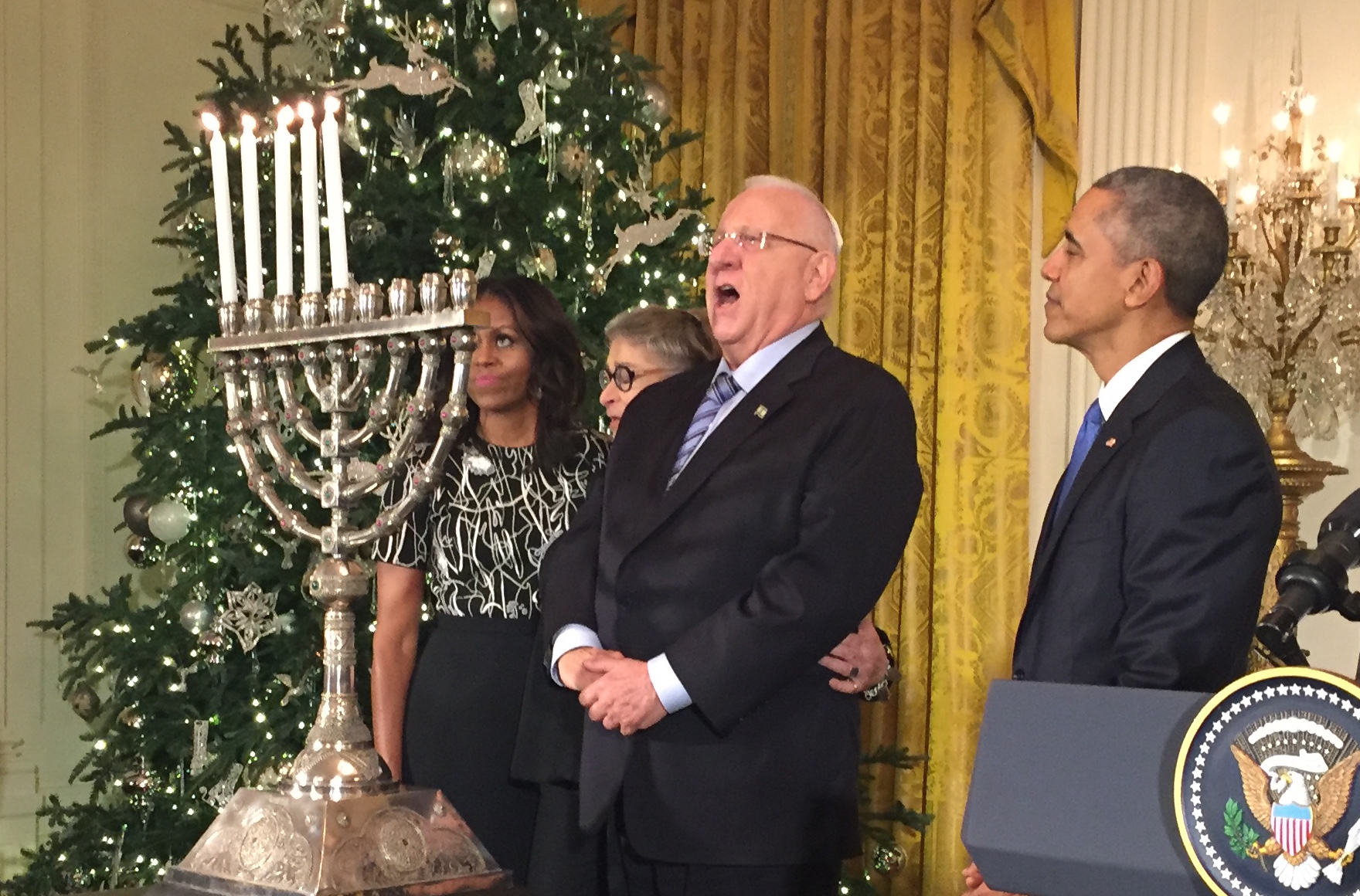 Israeli President Reuven Rivlin singing Maoz Tsur at a White House Hanukkah party while President Barack Obama and Rabbi Susan Talve of St. Louis look on, Dec. 9, 2015. (Steve Sheffey)