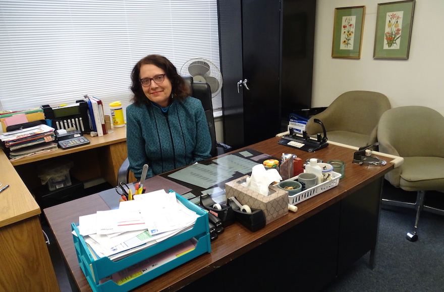 Ellen Gerecht, executive director of the National Center to Encourage Judaism, sitting in her office in Silver Spring, Maryland, Dec. 29, 2015. (Suzanne Pollak/Washington Jewish Week)