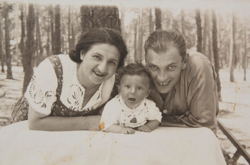 Michael Hochberg as a baby with his parents. (Courtesy of Jewish Foundation for the Righteous)