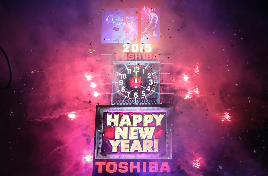 The ball dropping at midnight in Times Square in New York City, Jan. 1, 2015. (Cem Ozdel/Anadolu Agency/Getty Images)