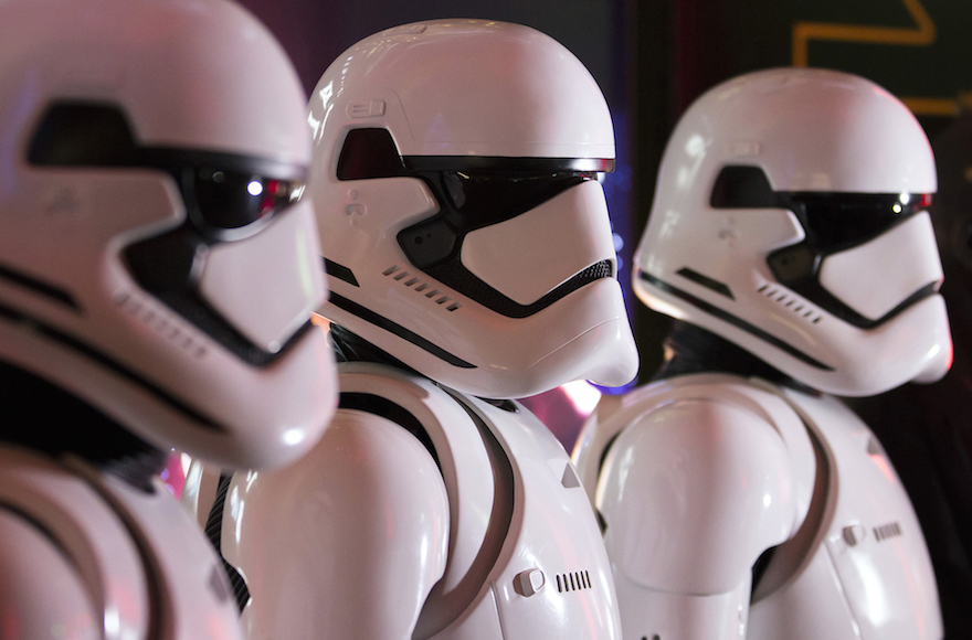 Fans wearing Storm Trooper costumes ahead of the first public screening of "Star Wars: The Force Awakens" at TOHO Cinemas in Tokyo, Japan, Dec. 18, 2015. (Tomohiro Ohsumi/Bloomberg/Getty Images)