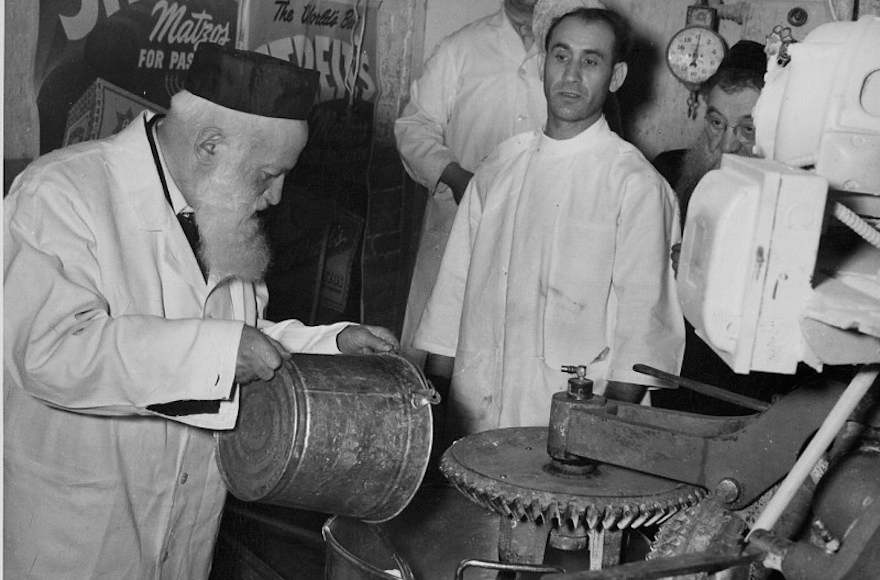 Mixing water with flour to make matzah dough at Streit's Matzo Factory on Manhattan's Lower East Side, date unknown. (Courtesy of Streit's Matzos)