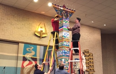 Ahavath Sholom members put finishing touches on the Lego menorah, Dec. 7, 2015. (Courtesy Ahavath Sholom)