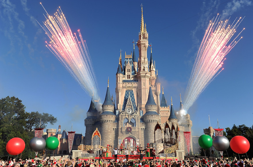 Concert goers cheering at the Magic Kingdom park at Walt Disney World Resort in Lake Buena Vista, Florida, Dec. 6, 2013. (Mark Ashman/Disney Parks via Getty Images)