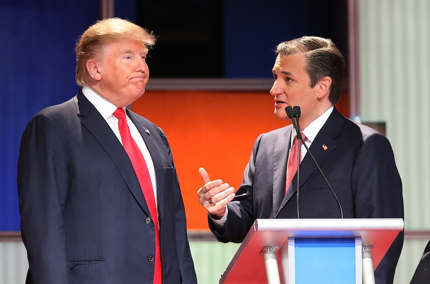 Republican presidential candidates Donald Trump, left, and Sen. Ted Cruz, R-Tx., speaking during a commercial break in the Fox Business Network Republican presidential debate in North Charleston, South Carolina, Jan. 14, 2016. (Scott Olson/Getty Images)