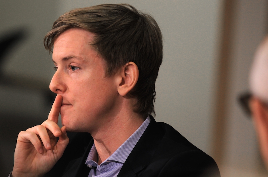 Chris Hughes speaking at Harvard University, Feb. 5, 2015. (Jonathan Wiggs/The Boston Globe via Getty Images)