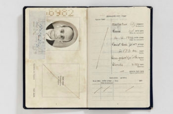 Falsified Israeli passport prepared for Adolf Eichmann in the name of “Ze’ev Zichroni,” including a photograph that was taken and developed in a safe house, 1960. (Mossad Archive)