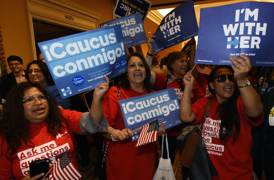 Voters chanting as they wait in line to get into a Democratic caucus at Caesars Palace in Las Vegas, Nevada, Feb. 20, 2016. (Ethan Miller/Getty Images)