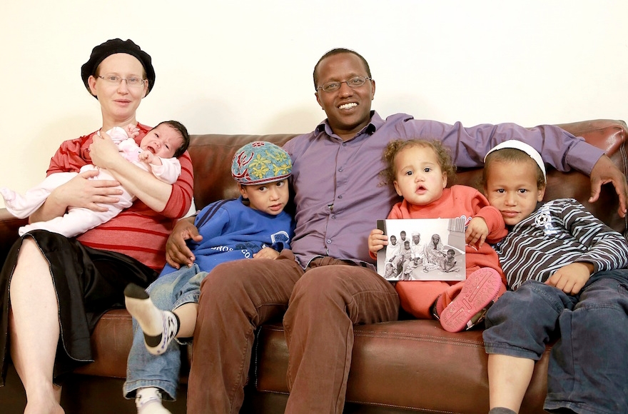 Shay Yossef and his wife Efrat with their children in at their home in Har Bracha. (Orli Malassa)