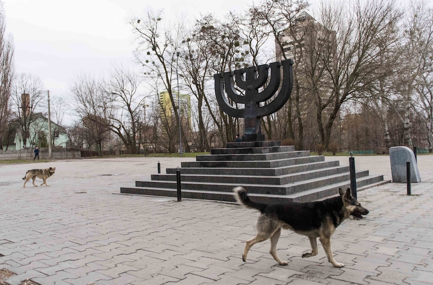 Stray dogs roam the Babi Yar monument on March 14, 2016 in Kiev, where Nazis and local collaborators murdered 30,000 Jews in 1941. (Cnaan Liphshiz)