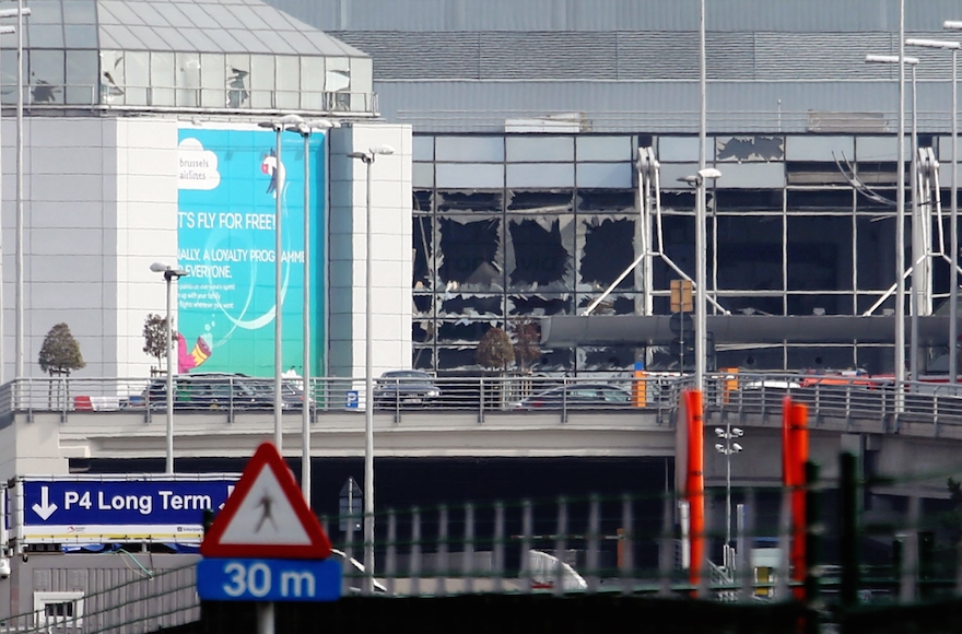 A view of bomb damage as passengers are evacuated from Zaventem Bruxelles International Airport after a terrorist attack on in Brussels, Belgium, March 22, 2016. (Sylvain Lefevre/Getty Images)