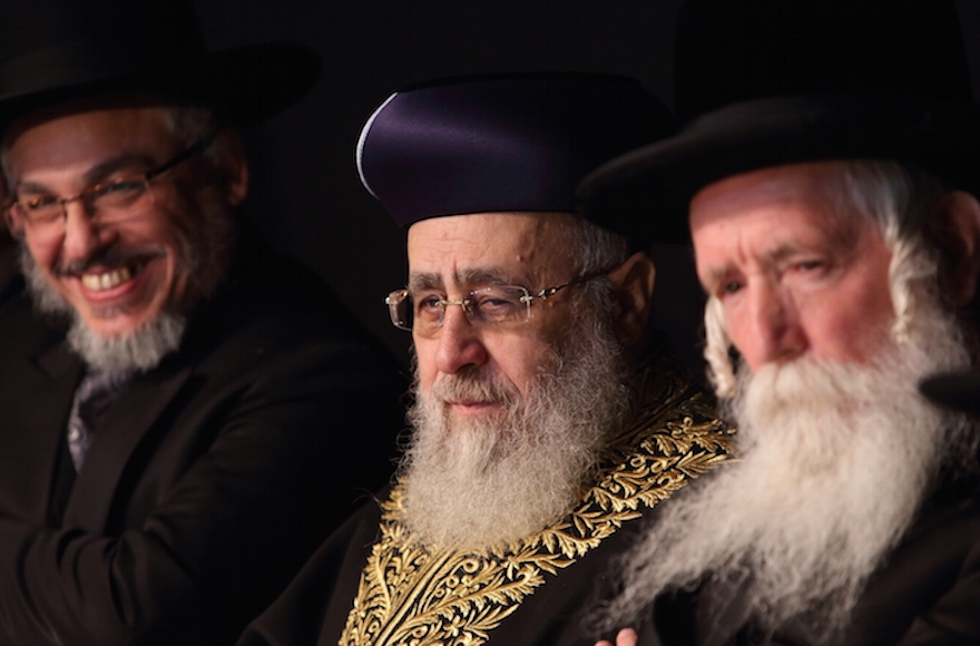 Israel's Chief Sephardi rabbi, Yitzhak Yosef, center, attending a competition on the Jewish Sabbath laws, Jan. 12, 2016. (Yaakov Naumi/Flash90)