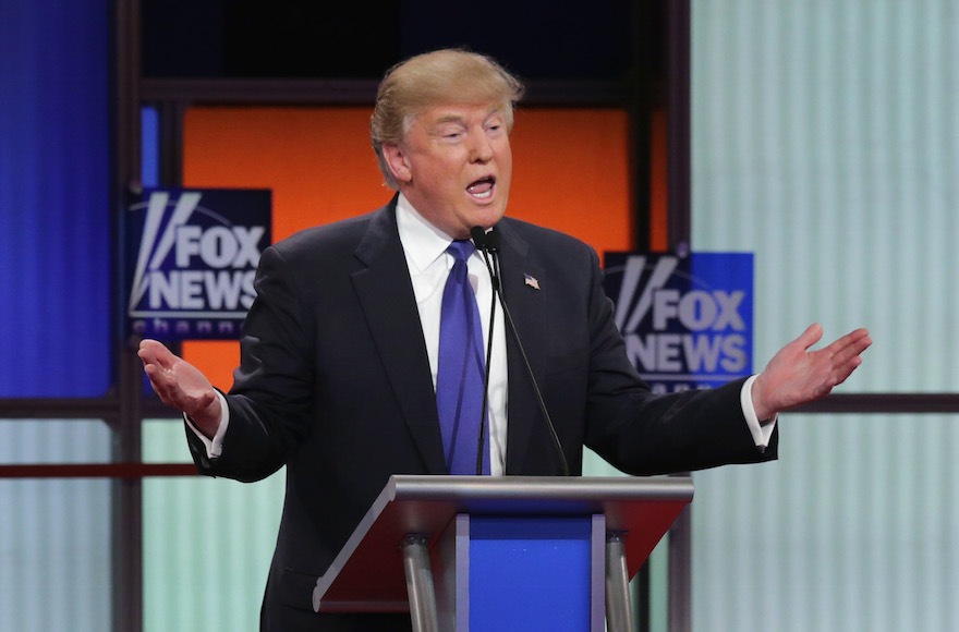 Donald Trump participating in a debate sponsored by Fox News at the Fox Theatre in Detroit, Michigan, March 3, 2016. (Chip Somodevilla/Getty Images)