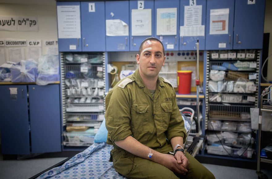 Roy Harel, a resident of the Jewish settlement of Eli, being treated at the Shaare Zedek Medical Center in Jerusalem, Israel, March 2, 2016. (Yonatan Sindel/Flash90)